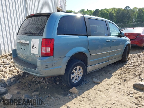 2010 Chrysler Town & Country Touring with VIN 2A4RR5D15AR308781, listed as a IAAI auction lot 42004797 with 100,148 mi miles. Bid and sale history available at carsss.com. Image 4.