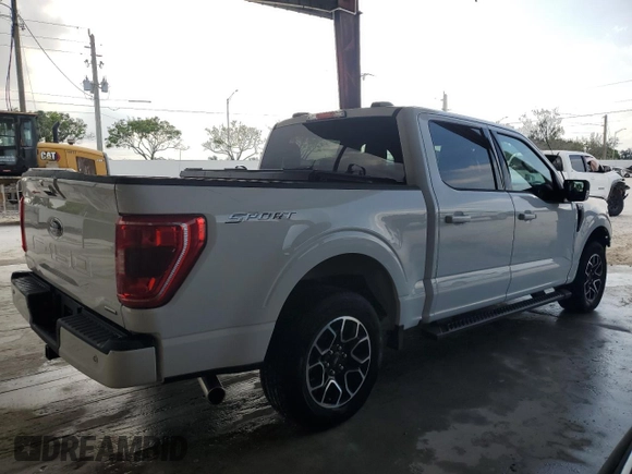 2023 Ford F-150 XL with VIN 1FTEW1CP9PKD19429, listed as a Copart auction lot 58021125 with 13,678 mi miles and Salvage title. Bid and sale history available at DreamBid. Image 3.