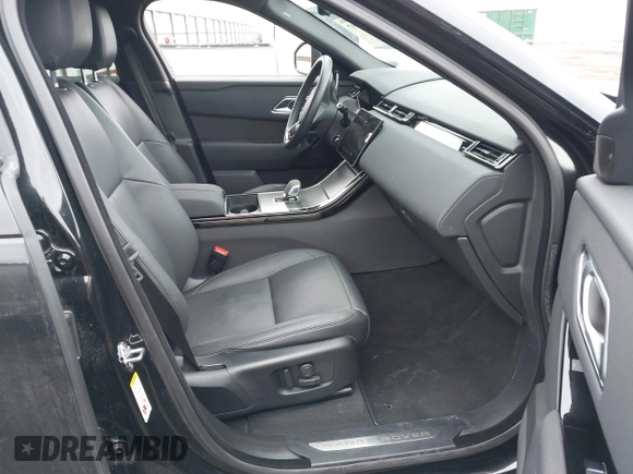 2025 Land Rover Range Rover Velar Dynamic SE z VIN SALYL2EX1SA397574, wystawiony jako IAAI lot #41707997 z przebiegiem 19 919 mil mil oraz . Historia ofert i sprzedaży dostępna na DreamBid. Obrazek 5.