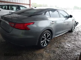 2018 Nissan Maxima Platinum z VIN 1N4AA6AP4JC390235, wystawiony jako IAAI lot #42376364 z przebiegiem 152 293 mil mil oraz . Historia ofert i sprzedaży dostępna na DreamBid. Obrazek 4.