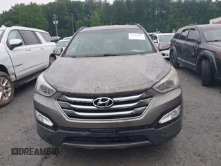 2015 Hyundai Santa Fe z VIN 5XYZU3LB4FG264397, wystawiony jako IAAI lot #42362877 z przebiegiem 177 252 mil mil oraz . Historia ofert i sprzedaży dostępna na DreamBid. Obrazek 12.