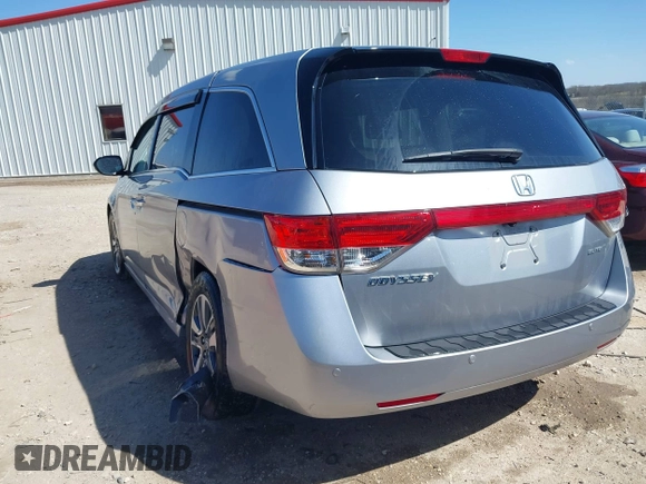2016 Honda Odyssey Touring Elite with VIN 5FNRL5H96GB090653, listed as a IAAI auction lot 41720195 with 68,969 mi miles. Bid and sale history available at carsss.com. Image 3.