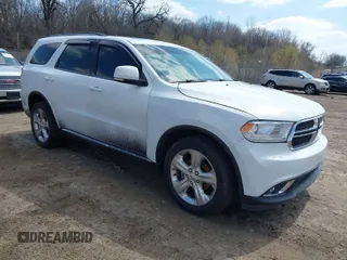 2014 Dodge Durango Limited z VIN 1C4RDJDG9EC345400, wystawiony jako IAAI lot #42023709 z przebiegiem 145 316 mil mil oraz . Historia ofert i sprzedaży dostępna na DreamBid. Obrazek 1.