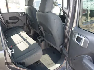 2022 Jeep Wrangler Unlimited Sport S with VIN 1C4HJXDG5NW105931, listed as a IAAI auction lot 42349628 with 37,314 mi miles and . Bid and sale history available at DreamBid. Image 8.