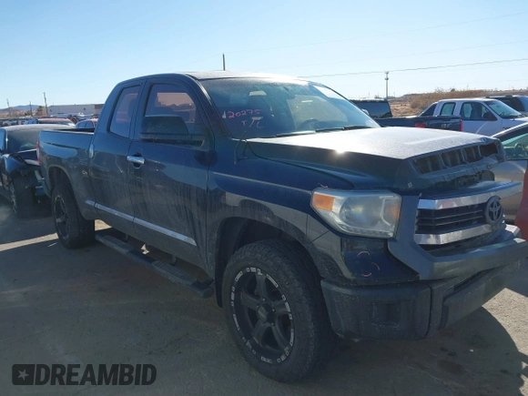 2014 Toyota Tundra 4WD Truck SR with VIN 5TFUM5F17EX051674, listed as a IAAI auction lot 41296906 with 140,782 mi miles. Bid and sale history available at carsss.com. Image 13.