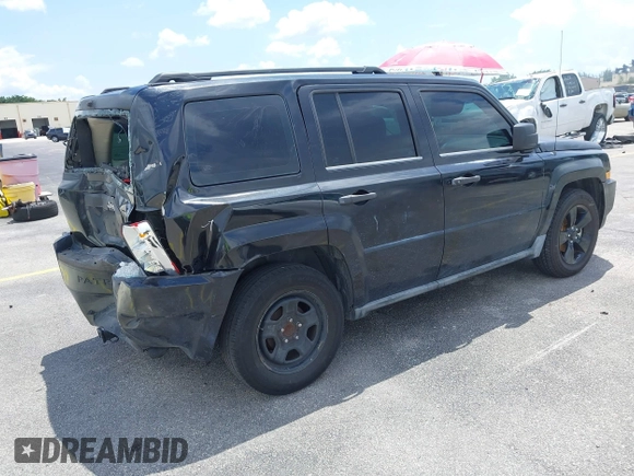 2009 Jeep Patriot Sport with VIN 1J4FT28BX9D140446, listed as a IAAI auction lot 40098694 with 202,342 mi miles and . Bid and sale history available at DreamBid. Image 4.