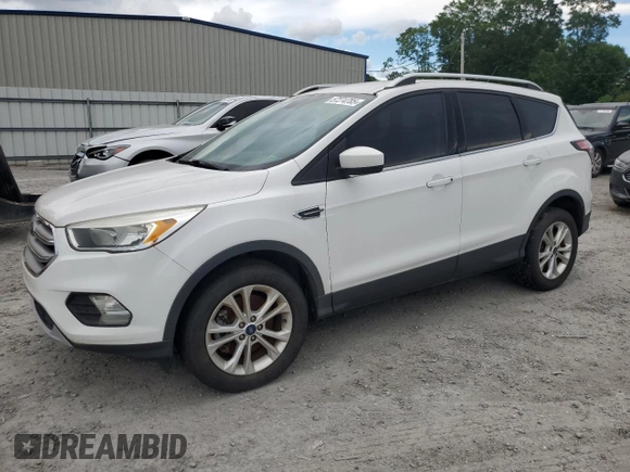 2017 Ford Escape SE z VIN 1FMCU0G99HUA75866, wystawiony jako Copart lot #57274785 z przebiegiem 132 874 mil mil oraz Czysty tytuł • Clean title. Historia ofert i sprzedaży dostępna na DreamBid. Obrazek 1.