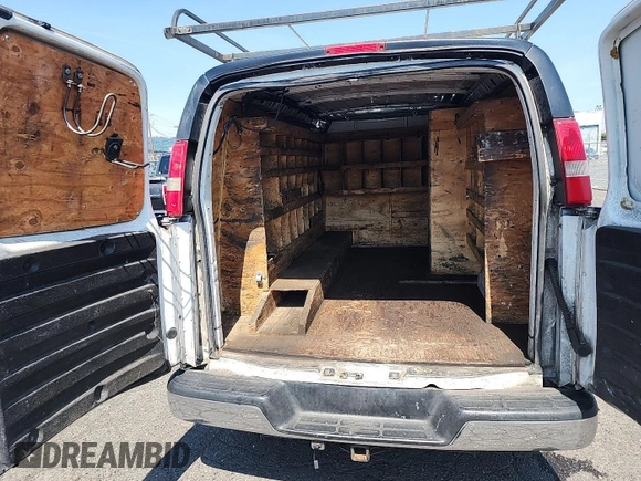 2015 Chevrolet Express Cargo with VIN 1GCWGFCF3F1123576, listed as a IAAI auction lot 42654774 with 183,911 mi miles and . Bid and sale history available at DreamBid. Image 3.