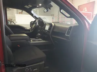 2015 Ford F-150 XLT with VIN 1FTEW1EG8FFC25479, listed as a IAAI auction lot 42010036 with 92,958 mi miles and . Bid and sale history available at carsss.com. Image 5.