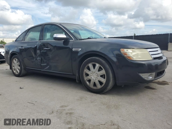 2008 Ford Taurus Limited with VIN 1FAHP25W78G128851, listed as a Copart auction lot 61254015 with 216,335 mi miles and Salvage title. Bid and sale history available at DreamBid. Image 4.