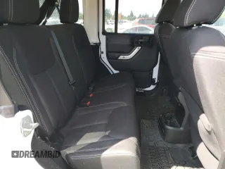 2014 Jeep Wrangler Unlimited Sahara z VIN 1C4BJWEG8EL188271, wystawiony jako Copart lot #59972535 z przebiegiem 130 314 mil mil oraz Szkoda całkowita • Salvage title. Historia ofert i sprzedaży dostępna na DreamBid. Obrazek 10.
