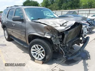 2011 Chevrolet Tahoe LS with VIN 1GNSCAE06BR274758, listed as a IAAI auction lot 42342317 with 266,134 mi miles and . Bid and sale history available at DreamBid. Image 1.