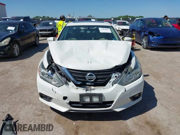 2016 Nissan Altima SR with VIN 1N4AL3AP1GC218973, listed as a IAAI auction lot 42080482 with 169,869 mi miles and . Bid and sale history available at carsss.com. Image 12.