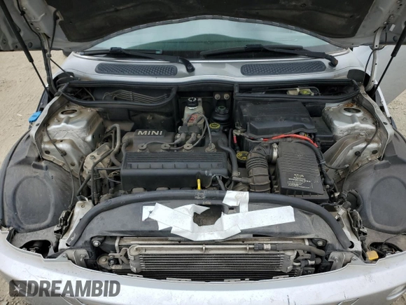 2005 MINI Hardtop with VIN WMWRC335X5TJ70165, listed as a Copart auction lot 53918445 with 145,572 mi miles and Salvage title. Bid and sale history available at DreamBid. Image 11.