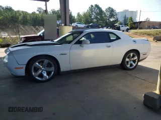 2016 Dodge Challenger R/T Plus z VIN 2C3CDZBT4GH101016, wystawiony jako Copart lot #68342634 z przebiegiem 128 794 mil mil oraz Czysty tytuł • Clean title. Historia ofert i sprzedaży dostępna na DreamBid. Obrazek 1.