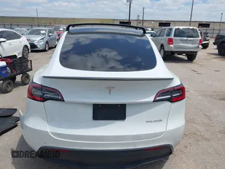 2021 Tesla Model Y Performance with VIN 5YJYGDEF9MF081798, listed as a IAAI auction lot 42033358 with 64,679 mi miles and . Bid and sale history available at DreamBid. Image 17.