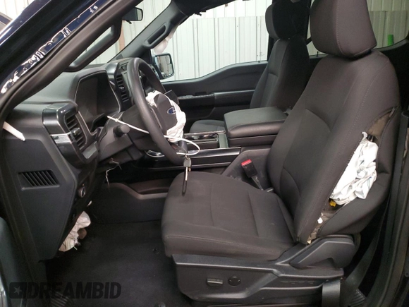 2023 Ford F-150 with VIN 1FTFW1P83PKE89261, listed as a Copart auction lot 46786025 with 9,079 mi miles and Salvage title. Bid and sale history available at DreamBid. Image 7.