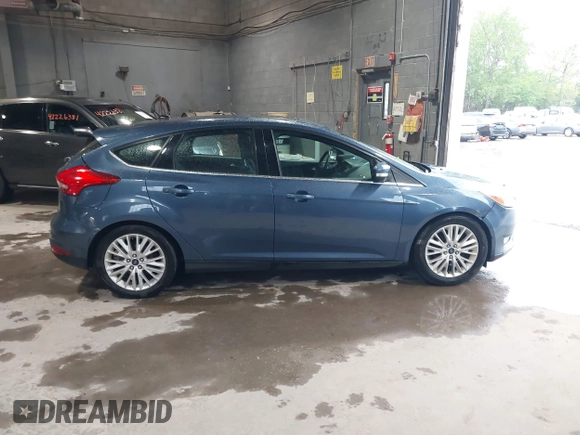 2018 Ford Focus Titanium with VIN 1FADP3N29JL242428, listed as a IAAI auction lot 42323967 with 200,662 mi miles and . Bid and sale history available at DreamBid. Image 13.