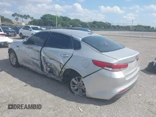2018 Kia Optima LX with VIN 5XXGT4L39JG235287, listed as a IAAI auction lot 41802035 with 96,412 mi miles. Bid and sale history available at carsss.com. Image 3.