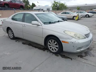 2003 Lexus ES 300 with VIN JTHBF30G330137880, listed as a IAAI auction lot 42074863 with 232,533 mi miles. Bid and sale history available at carsss.com. Image 1.