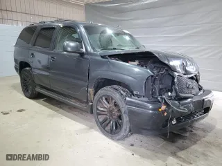 2004 GMC Yukon Denali with VIN 1GKEK63U34J326848, listed as a Copart auction lot 49014285 with 225,388 mi miles and Salvage Title. Bid and sale history available at carsss.com. Image 4.