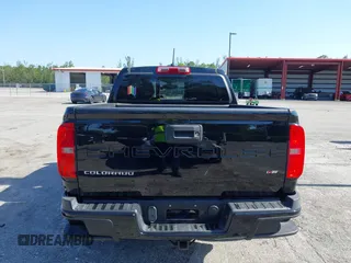 2021 Chevrolet Colorado 2WD LT z VIN 1GCGSCEN1M1131727, wystawiony jako IAAI lot #42181484 z przebiegiem 54 764 mil mil oraz . Historia ofert i sprzedaży dostępna na DreamBid. Obrazek 16.