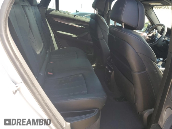 2019 BMW X6 xDrive50i with VIN 5UXKU6C56K0Z67074, listed as a Copart auction lot 65494064 with 97,702 mi miles and Salvage Title. Bid and sale history available at carsss.com. Image 11.
