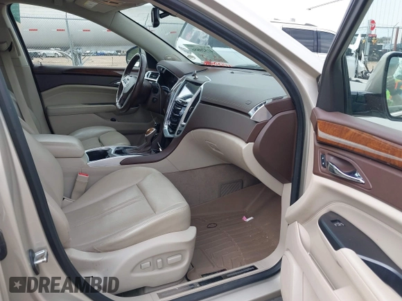 2014 Cadillac SRX Luxury Collection with VIN 3GYFNBE38ES518054, listed as a IAAI auction lot 41520886 with 108,905 mi miles and . Bid and sale history available at DreamBid. Image 5.