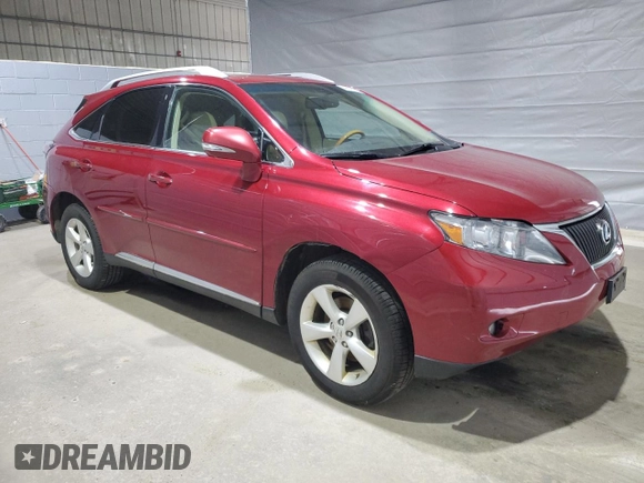 2011 Lexus RX 350 with VIN 2T2BK1BA0BC096540, listed as a Copart auction lot 48658195 with 123,672 mi miles and Salvage Title. Bid and sale history available at DreamBid. Image 4.