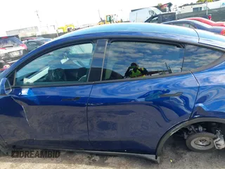 2022 Tesla Model Y Long Range with VIN 7SAYGDEE6NF318372, listed as a IAAI auction lot 41526857 with 26,083 mi miles and . Bid and sale history available at carsss.com. Image 14.