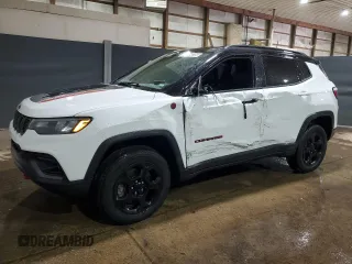 2023 Jeep Compass Trailhawk z VIN 3C4NJDDN1PT527851, wystawiony jako Copart lot #65566035 z przebiegiem 52 811 mil mil oraz Czysty tytuł • Clean title. Historia ofert i sprzedaży dostępna na DreamBid. Obrazek 1.