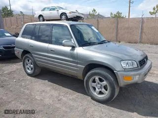 1999 Toyota RAV4 with VIN JT3HP10V1X7133260, listed as a IAAI auction lot 41975559 with 133,279 mi miles. Bid and sale history available at carsss.com. Image 1.