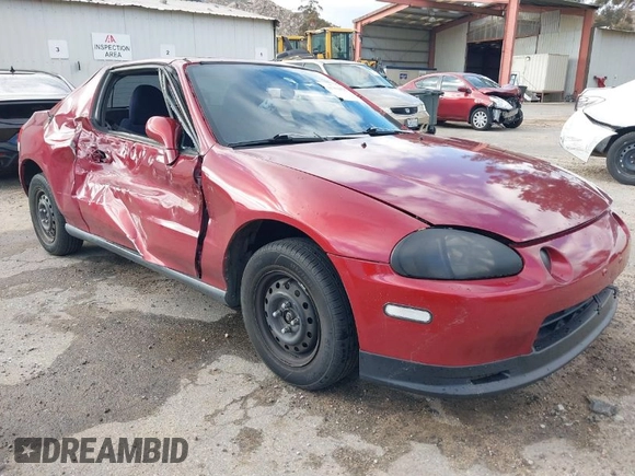 1995 Honda del Sol S with VIN JHMEG1144SS003580, listed as a IAAI auction lot 41701598 with 276,749 mi miles. Bid and sale history available at carsss.com. Image 1.