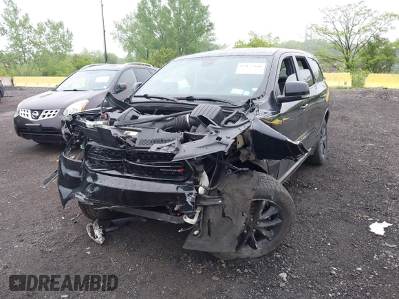 2017 Dodge Durango R/T with VIN 1C4SDJCTXHC878876, listed as a IAAI auction lot 42175360 with 61,323 mi miles and . Bid and sale history available at carsss.com. Image 2.