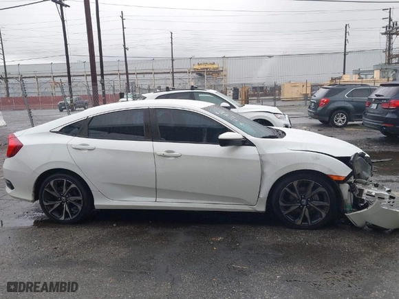 2021 Honda Civic Sedan Sport with VIN 2HGFC2F87MH516577, listed as a IAAI auction lot 41573695 with 94,768 mi miles. Bid and sale history available at carsss.com. Image 13.