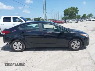2018 Kia Forte LX z VIN 3KPFK4A70JE197056, wystawiony jako IAAI lot #42435555 z przebiegiem 79 805 mil mil oraz . Historia ofert i sprzedaży dostępna na DreamBid. Obrazek 14.