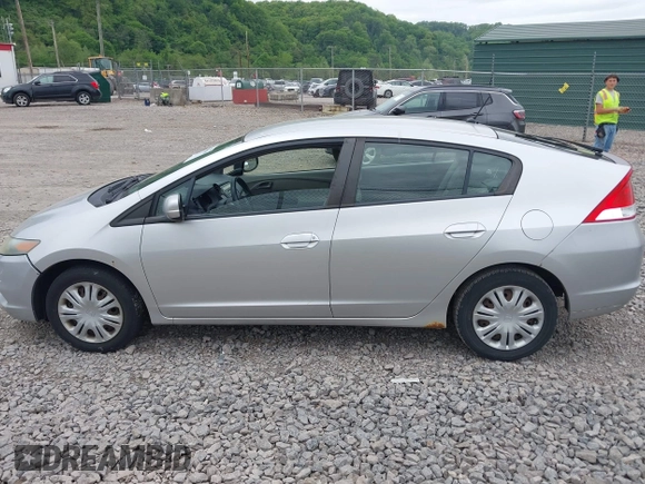 2010 Honda Insight LX with VIN JHMZE2H57AS008203, listed as a IAAI auction lot 42240869 with 150,562 mi miles and . Bid and sale history available at DreamBid. Image 14.