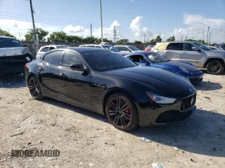 2017 Maserati Ghibli with VIN ZAM57XSS6H1249705, listed as a Copart auction lot 61602993 with 73,454 mi miles. Bid and sale history available at carsss.com. Image 4.