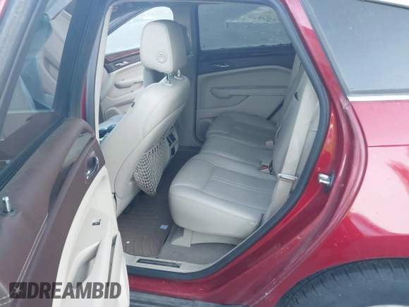 2011 Cadillac SRX Luxury Collection z VIN 3GYFNAEY2BS517192, wystawiony jako IAAI lot #42494074 z przebiegiem 191 094 mil mil oraz . Historia ofert i sprzedaży dostępna na DreamBid. Obrazek 8.