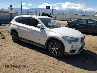 2018 BMW X1 xDrive28i z VIN WBXHT3C35J5K29010, wystawiony jako Copart lot #47537165 z przebiegiem 90 779 mil mil oraz Szkoda całkowita • Salvage title. Historia ofert i sprzedaży dostępna na DreamBid. Obrazek 4.