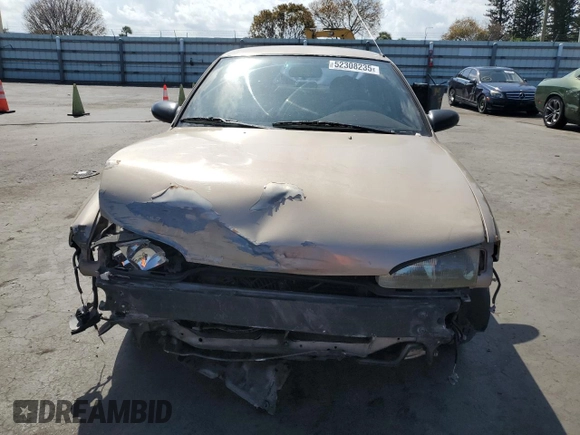 1997 Geo Prizm LSi z VIN 1Y1SK5263VZ408119, wystawiony jako Copart lot #52308235 z przebiegiem 344 971 mil mil oraz Szkody całkowita. Historia ofert i sprzedaży dostępna na DreamBid. Obrazek 5.