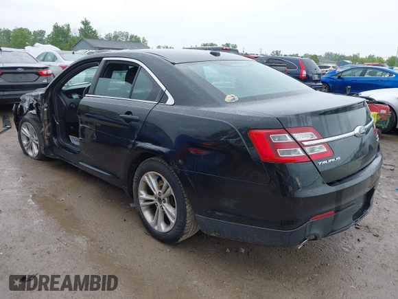 2015 Ford Taurus SEL z VIN 1FAHP2E86FG172631, wystawiony jako IAAI lot #42307630 z przebiegiem 95 184 mil mil oraz . Historia ofert i sprzedaży dostępna na DreamBid. Obrazek 3.
