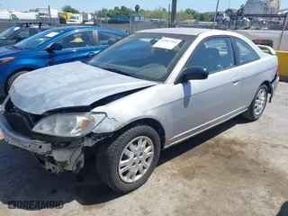 2005 Honda Civic LX with VIN 1HGEM21575L051616, listed as a IAAI auction lot 42067264 with 246,965 mi miles. Bid and sale history available at carsss.com. Image 2.