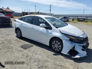 2021 Toyota Prius LE z VIN JTDKAMFP7M3191079, wystawiony jako Copart lot #57529195 z przebiegiem 52 809 mil mil oraz Szkoda całkowita • Salvage title. Historia ofert i sprzedaży dostępna na DreamBid. Obrazek 4.