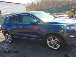 2015 Lincoln MKC with VIN 5LMTJ2AH2FUJ12531, listed as a IAAI auction lot 41639903 with 112,835 mi miles. Bid and sale history available at carsss.com. Image 13.