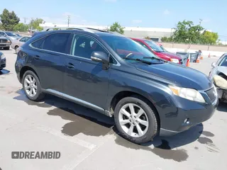 2010 Lexus RX 350 with VIN 2T2BK1BA8AC061209, listed as a IAAI auction lot 42105424 with 242,961 mi miles. Bid and sale history available at carsss.com. Image 1.