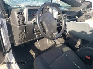 2003 Jeep Wrangler Rubicon z VIN 1J4FA69S53P375189, wystawiony jako Copart lot #54292035 z przebiegiem 55 863 mil mil oraz Szkoda całkowita • Salvage title. Historia ofert i sprzedaży dostępna na DreamBid. Obrazek 8.