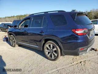 2023 Honda Pilot Touring with VIN 5FNYG2H73PB007631, listed as a Copart auction lot 82382153 with 6,050 mi miles. Bid and sale history available at carsss.com. Image 2.