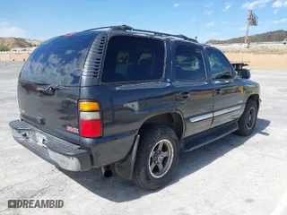 2005 GMC Yukon SLT with VIN 1GKEC13T25J178152, listed as a IAAI auction lot 41685936 with 226,765 mi miles. Bid and sale history available at carsss.com. Image 4.