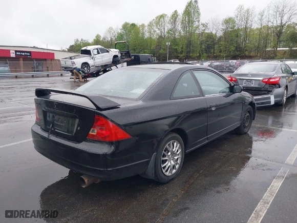 2001 Honda Civic EX with VIN 1HGEM22971L036545, listed as a IAAI auction lot 41978213 with 328,927 mi miles. Bid and sale history available at carsss.com. Image 4.